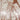 Tegel - Rood glans, close-up view of intricate marble texture with reddish veins on a white background.